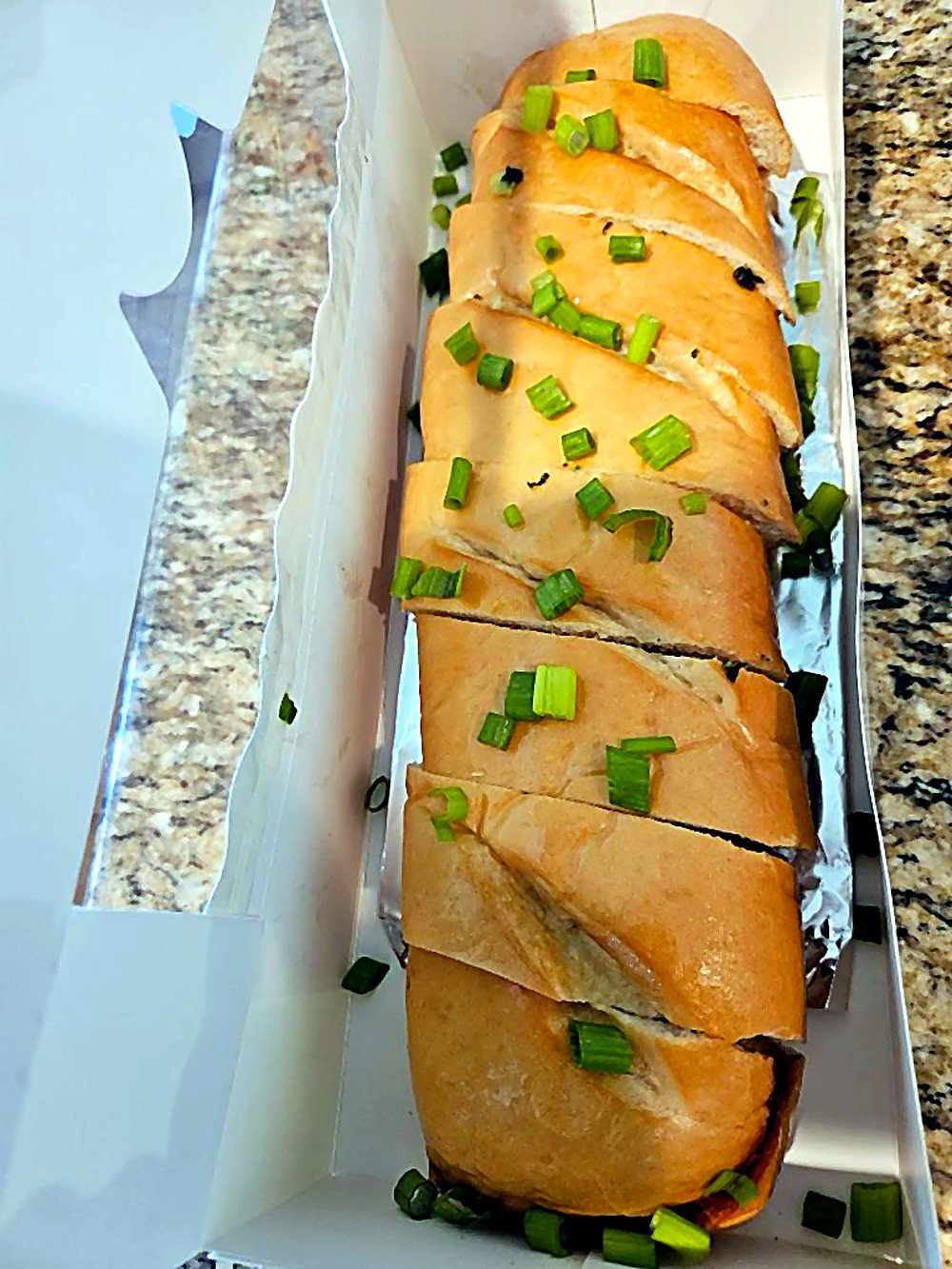 Golden garlic bread with green onions